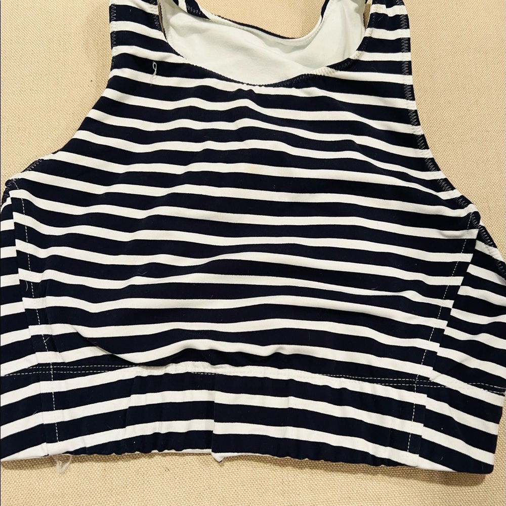 New Balance for J Crew workout sports bra that falls longer to where for too.